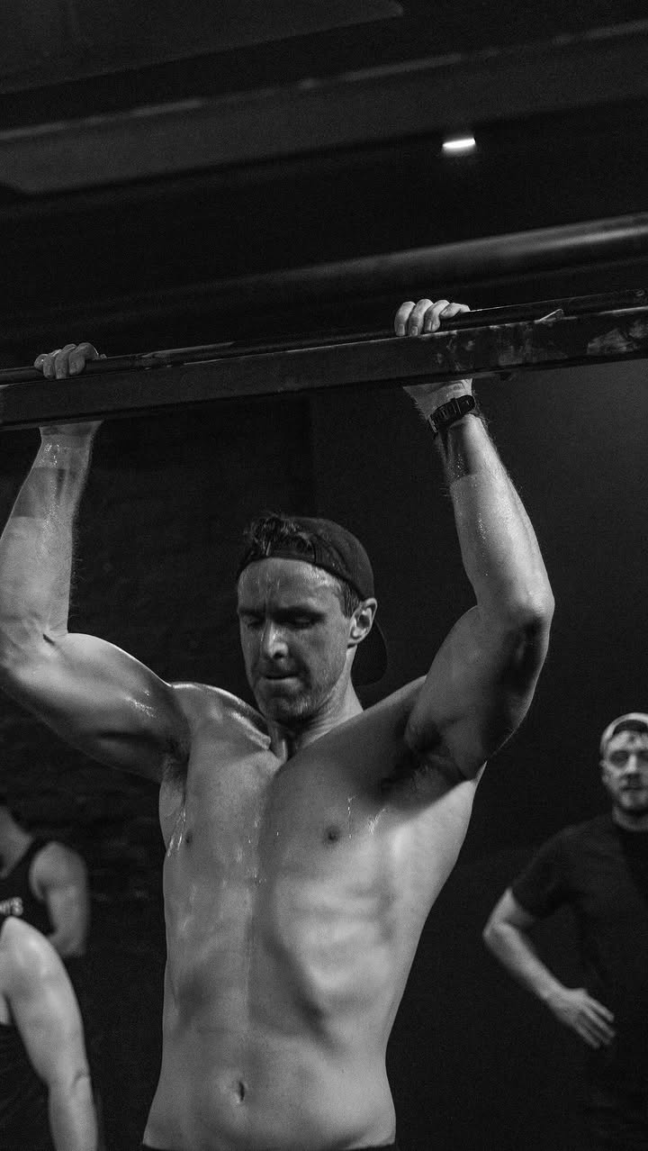 Athlete on pull-up bar